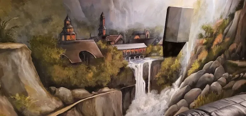 Steampunk Village Nestled in Misty Cliffs Mural in Memphis, TN