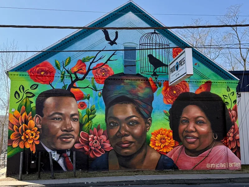 Three Visionaries Surrounded by Blooming Flowers Mural in Stamford, CT
