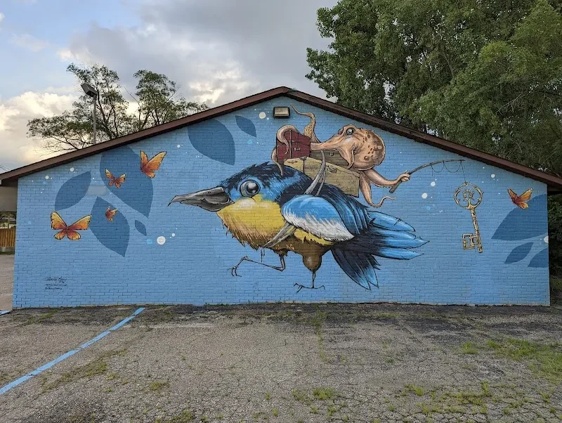 Child Riding Giant Bluebird Through Starlit Sky Mural in Sterling Heights, MI in Sterling Heights