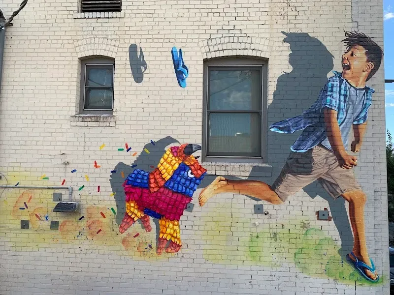 Ignacio Garcia Running of the Piñatas Mural in Tucson, AZ in Tucson