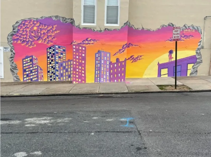 Cityscape with Goddess and Sunset Mural in Baltimore, MD