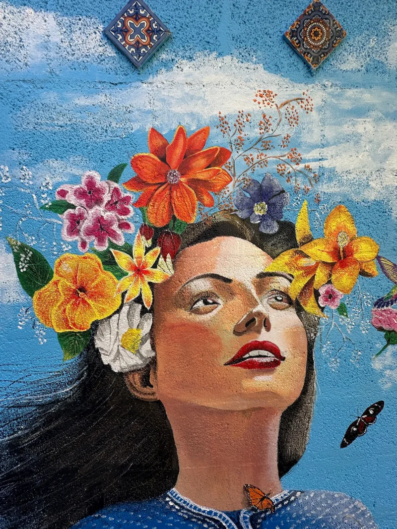 Woman with Blooming Flowers and Butterflies Mural in Peoria, AZ