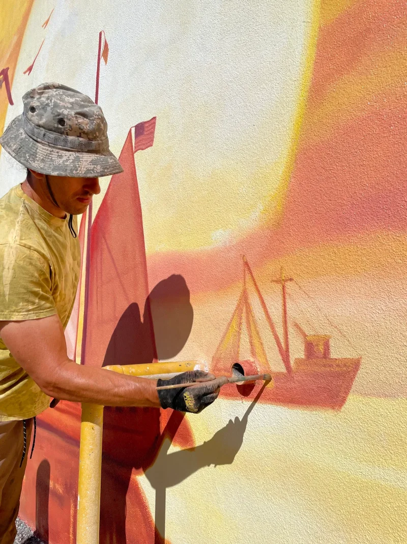 Fisherman with Sailing Boat and Flags Mural in Long Beach, CA