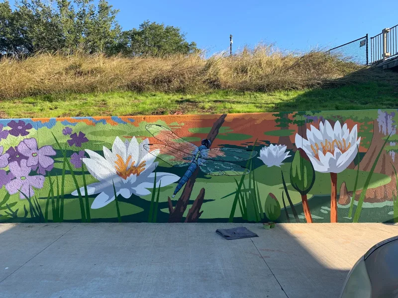 Dragonfly Among Water Lilies and Wildflowers Mural in Houston, TX in Houston