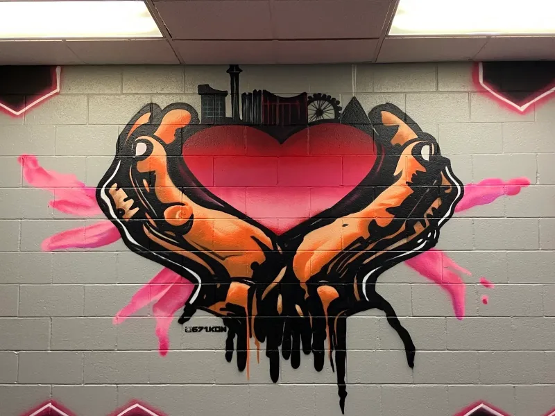 Hands Holding Heart Over Cityscape Mural in North Las Vegas, NV