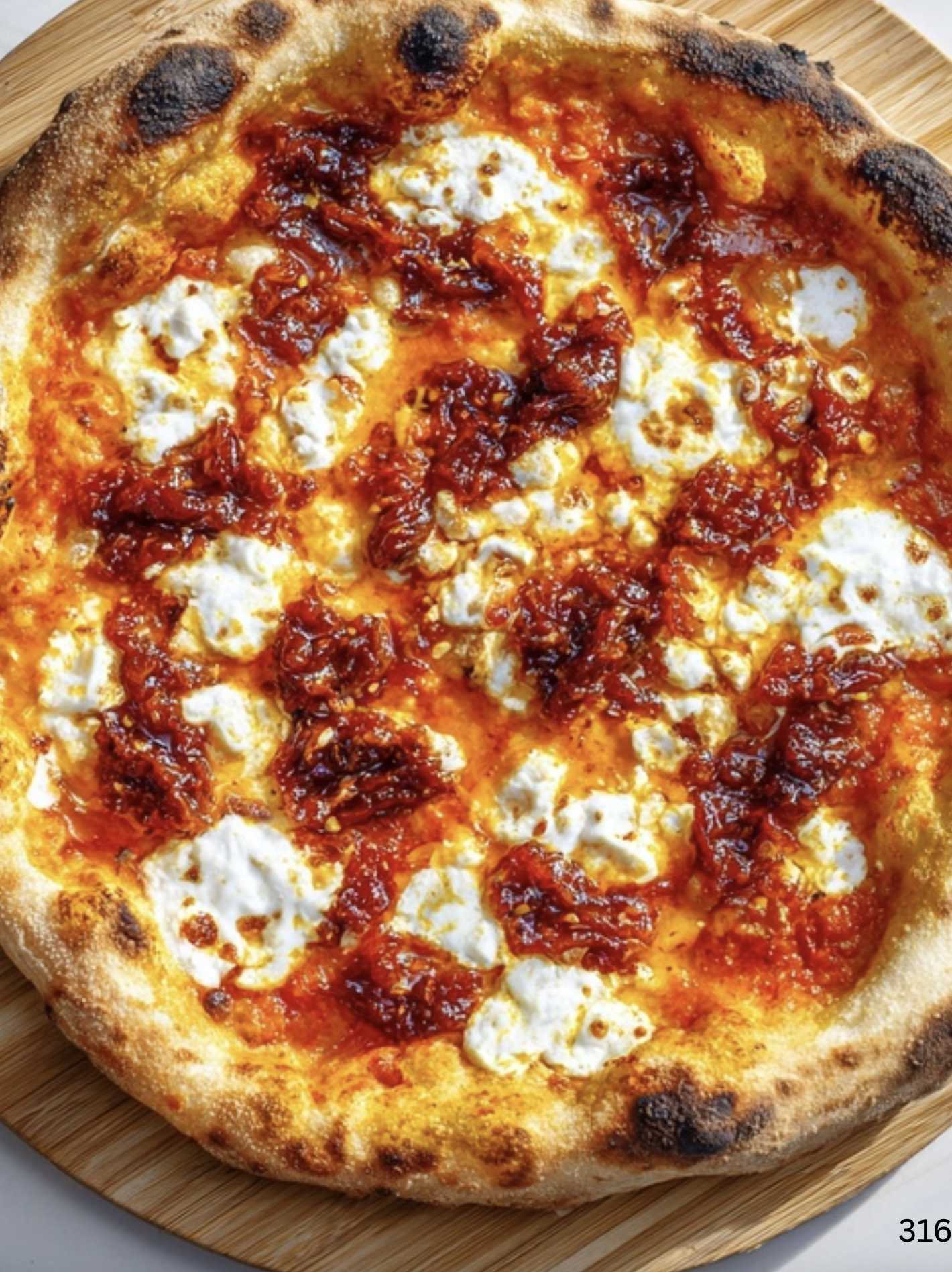 Spicy Calabrian Sausage & Sweet Onion Pizza