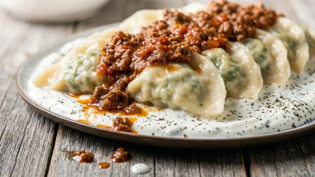 Ashak (Leek Dumplings with Meat Sauce)