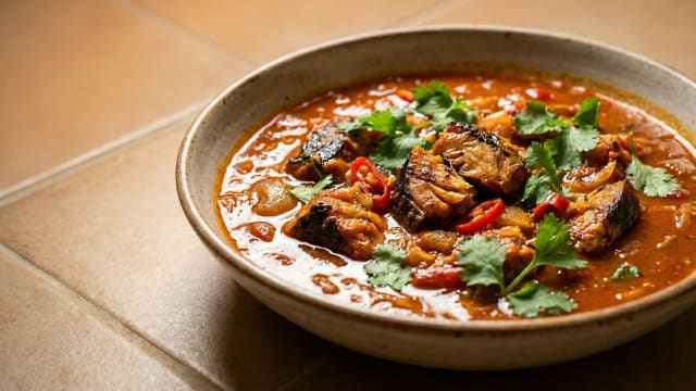 Palm Nut Soup with Smoked Fish