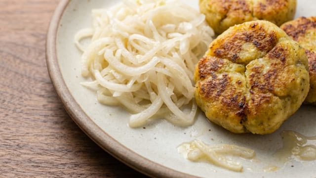 Bolón de Verde (Cheese-Filled Green Plantain Dumplings)