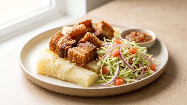 Yuca con Chicharrón (Cassava with Crisp Pork and Cabbage)