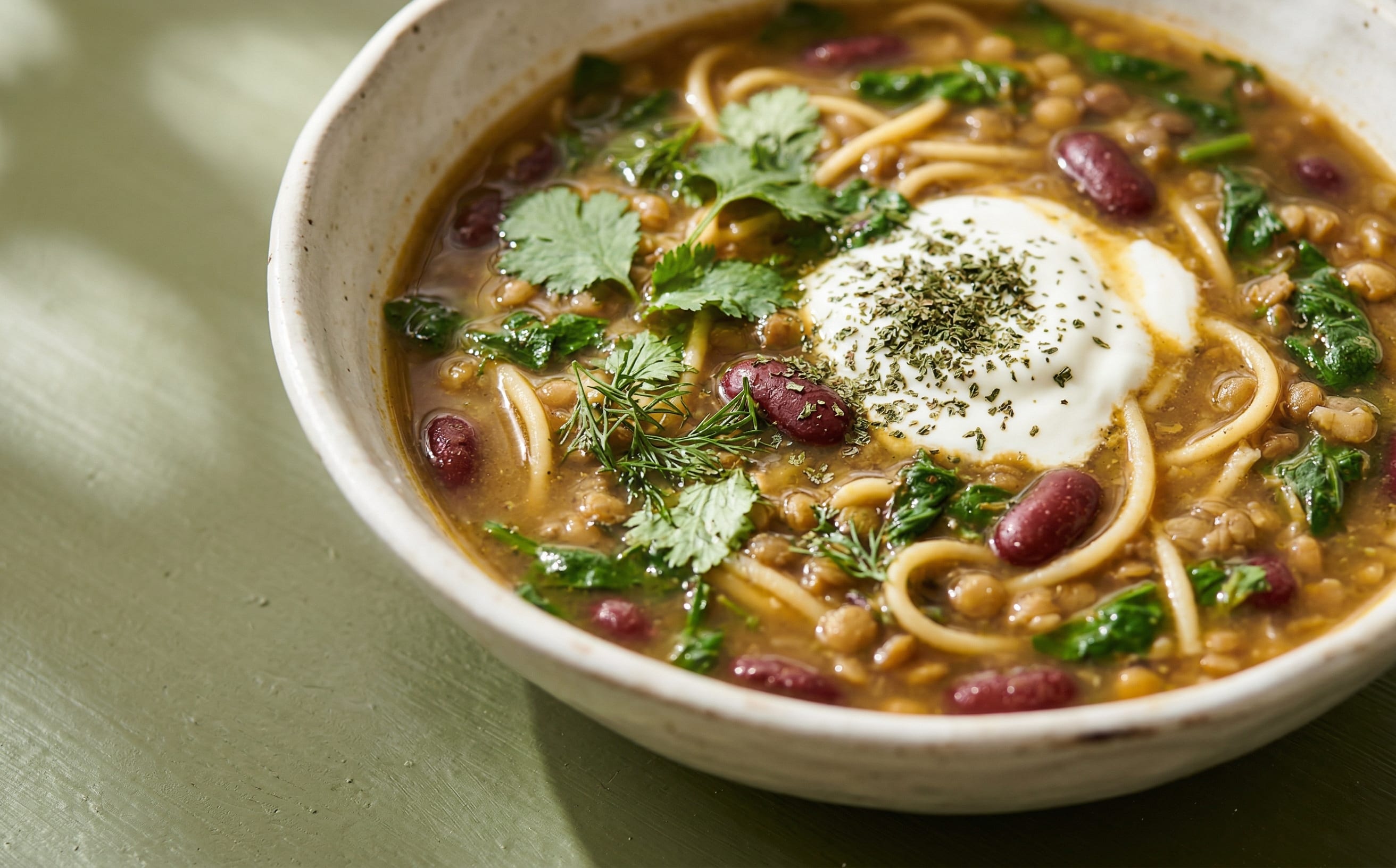 Aush (Noodle and Legume Soup)