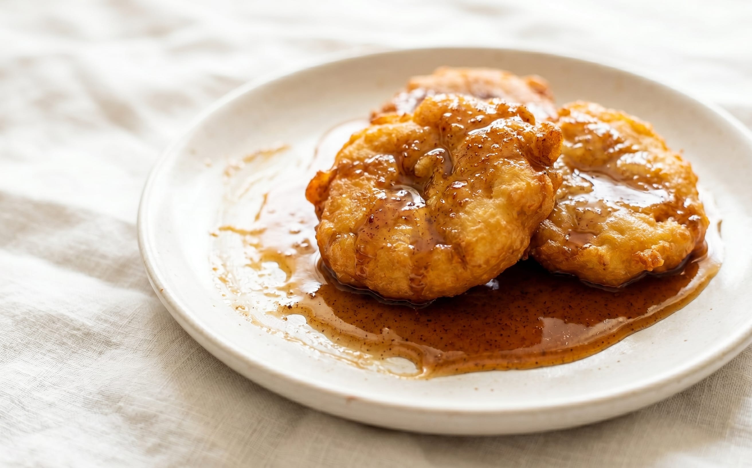 Nuégados de Yuca (Cassava Fritters with Panela Syrup)