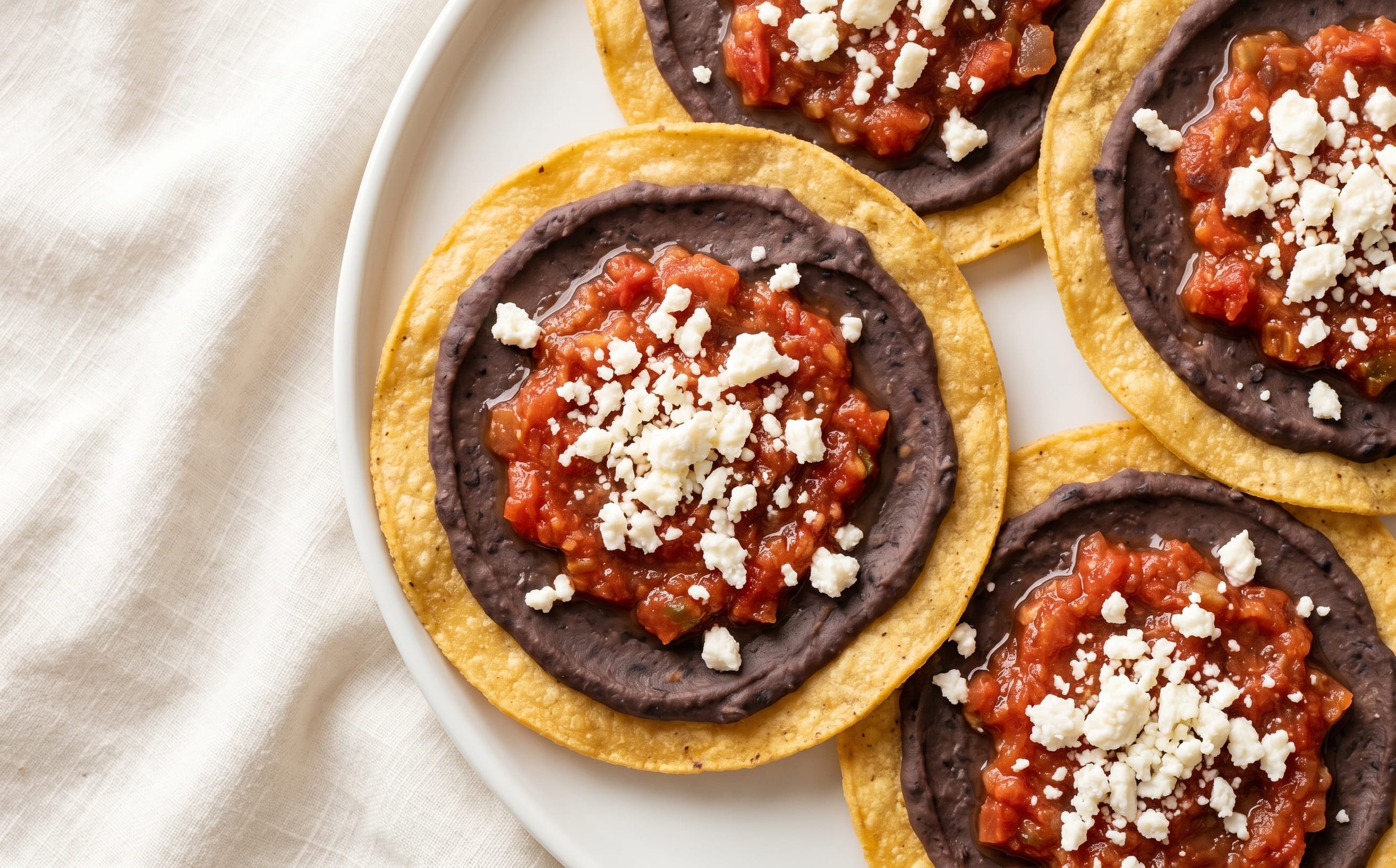 Tostadas de Frijol (Guatemalan Black Bean Tostadas)