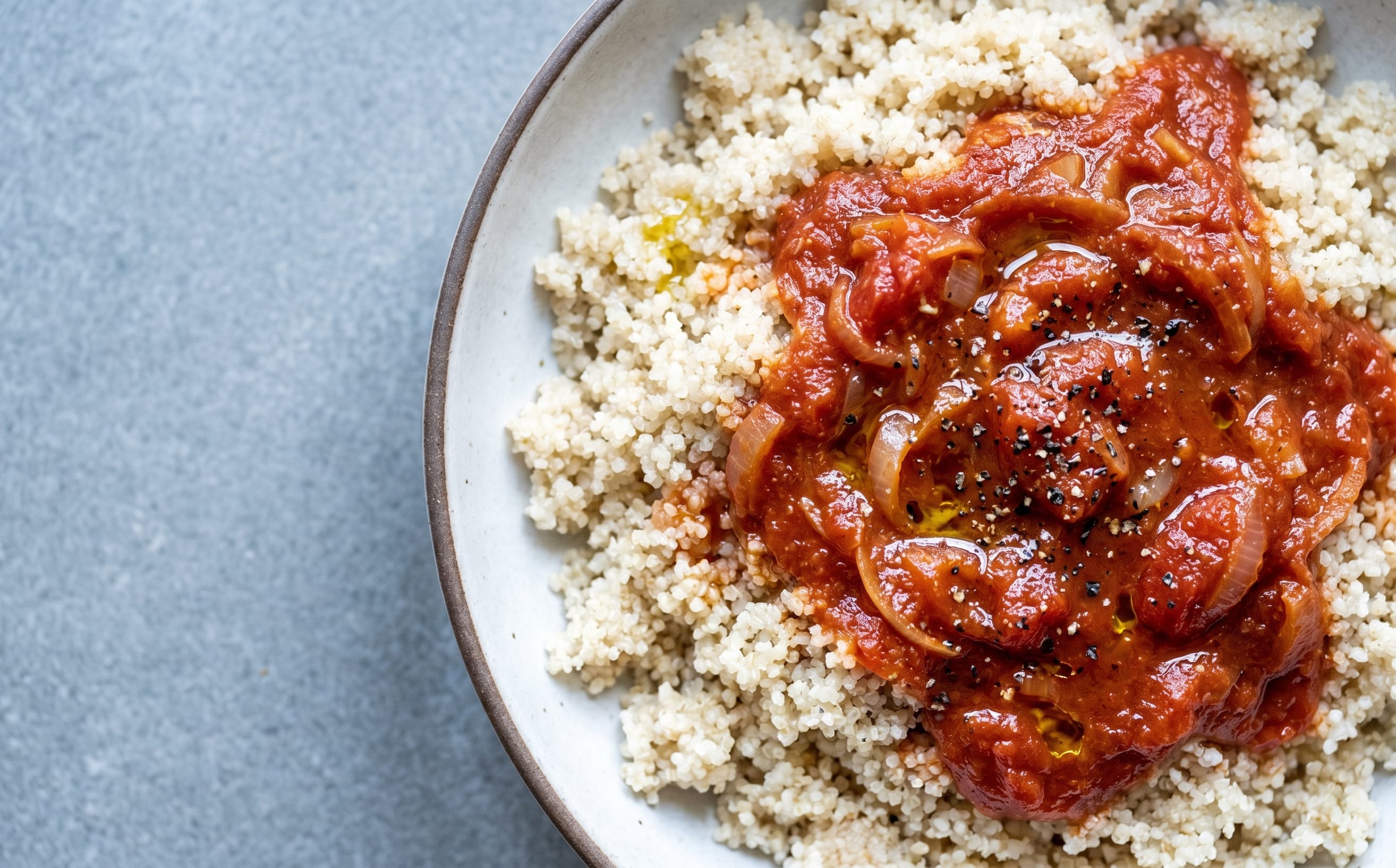Fonio with Tomato-Onion Sauce