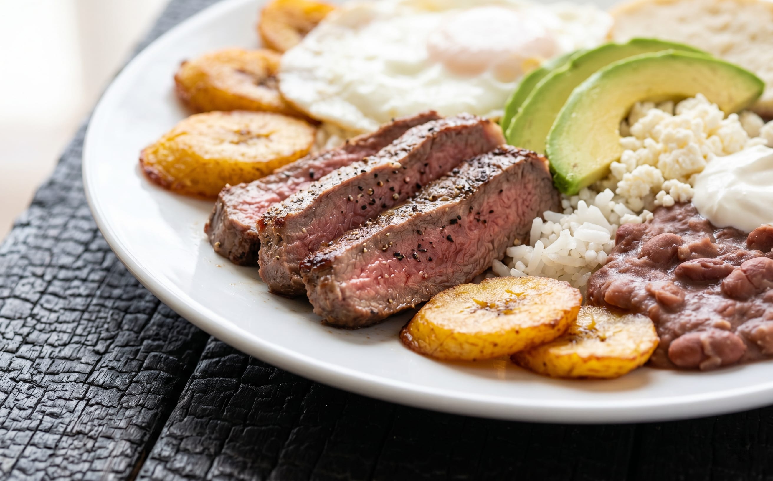 Plato Típico Hondureño (Steak, Beans, Rice, and Plantain)