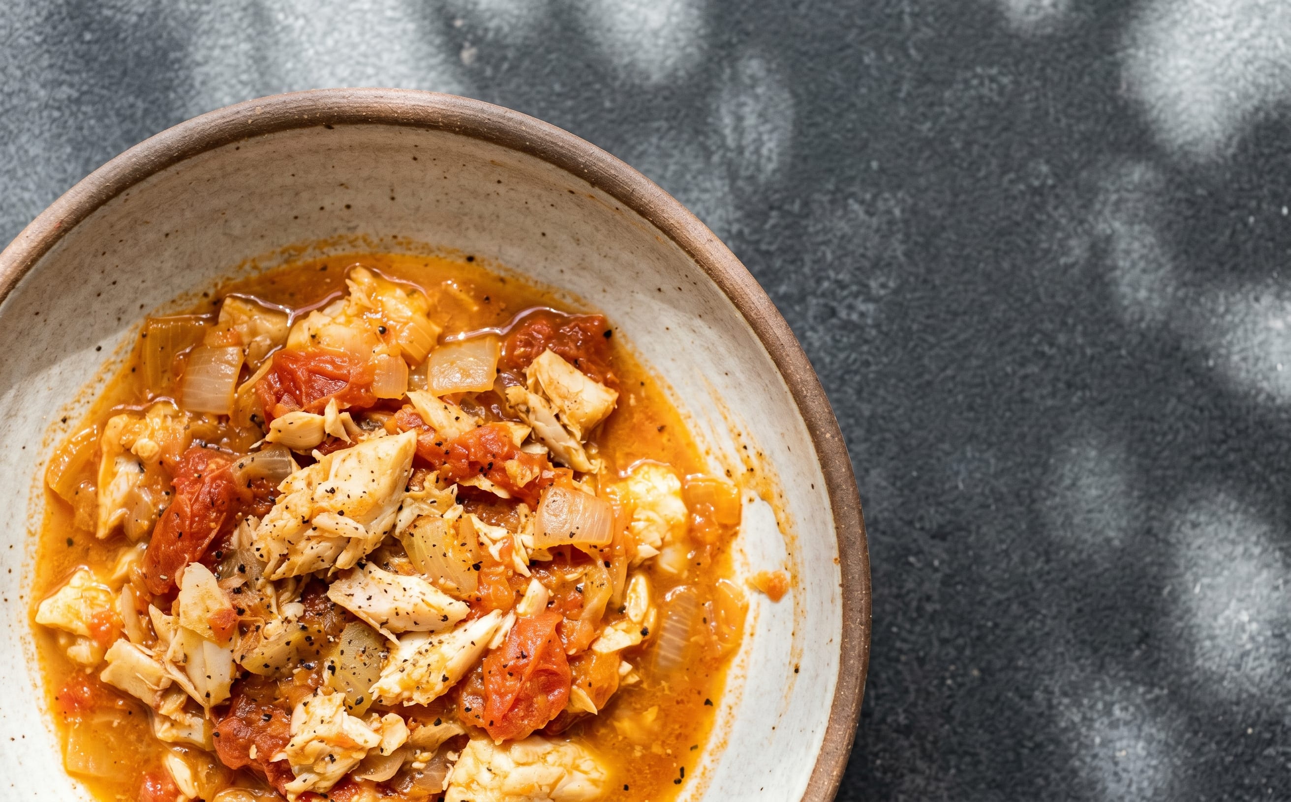 Montserrat-Style Saltfish and Tomato Stew