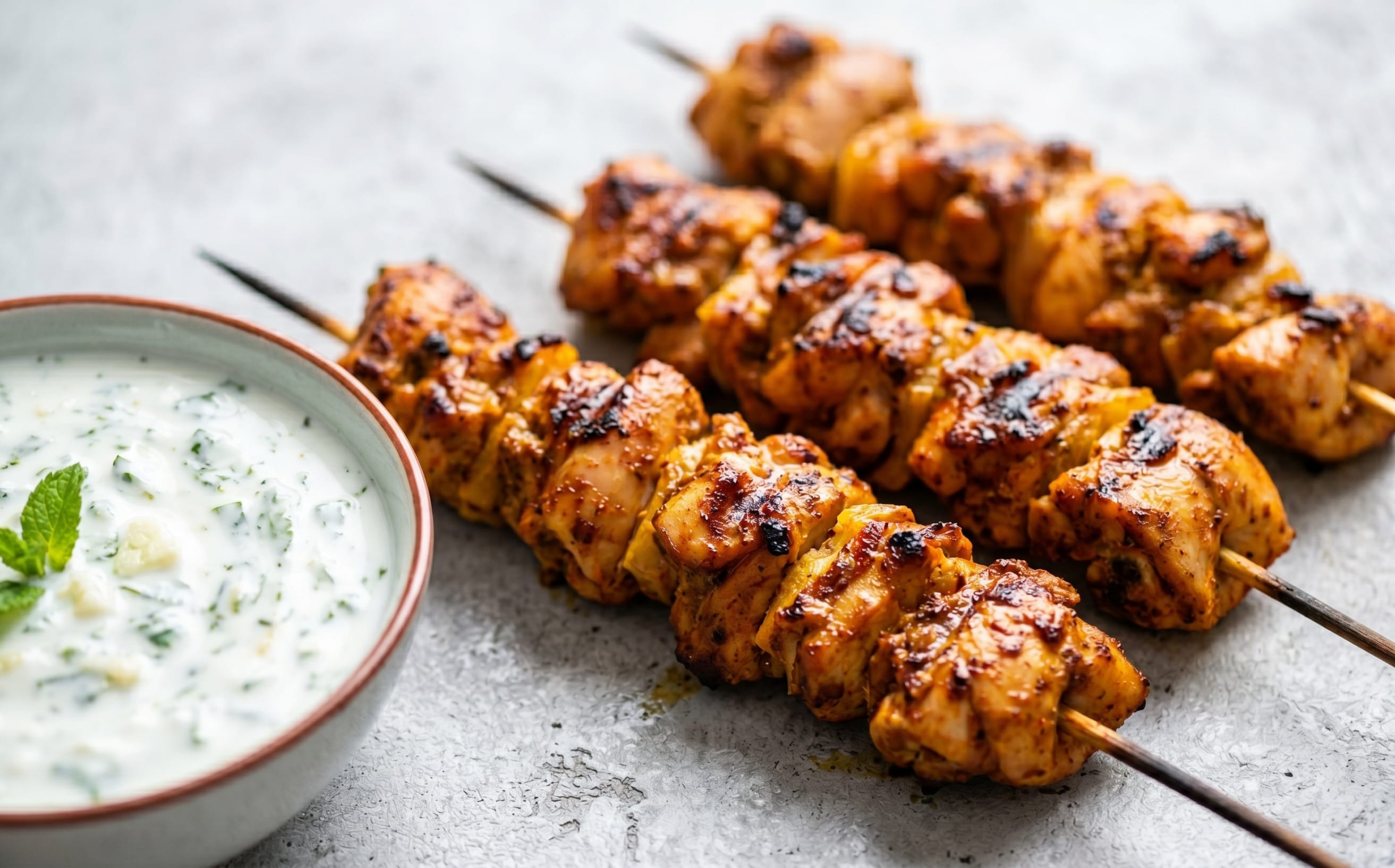 Mishkak Dajaj (Spiced Chicken Skewers with Mint Yogurt)