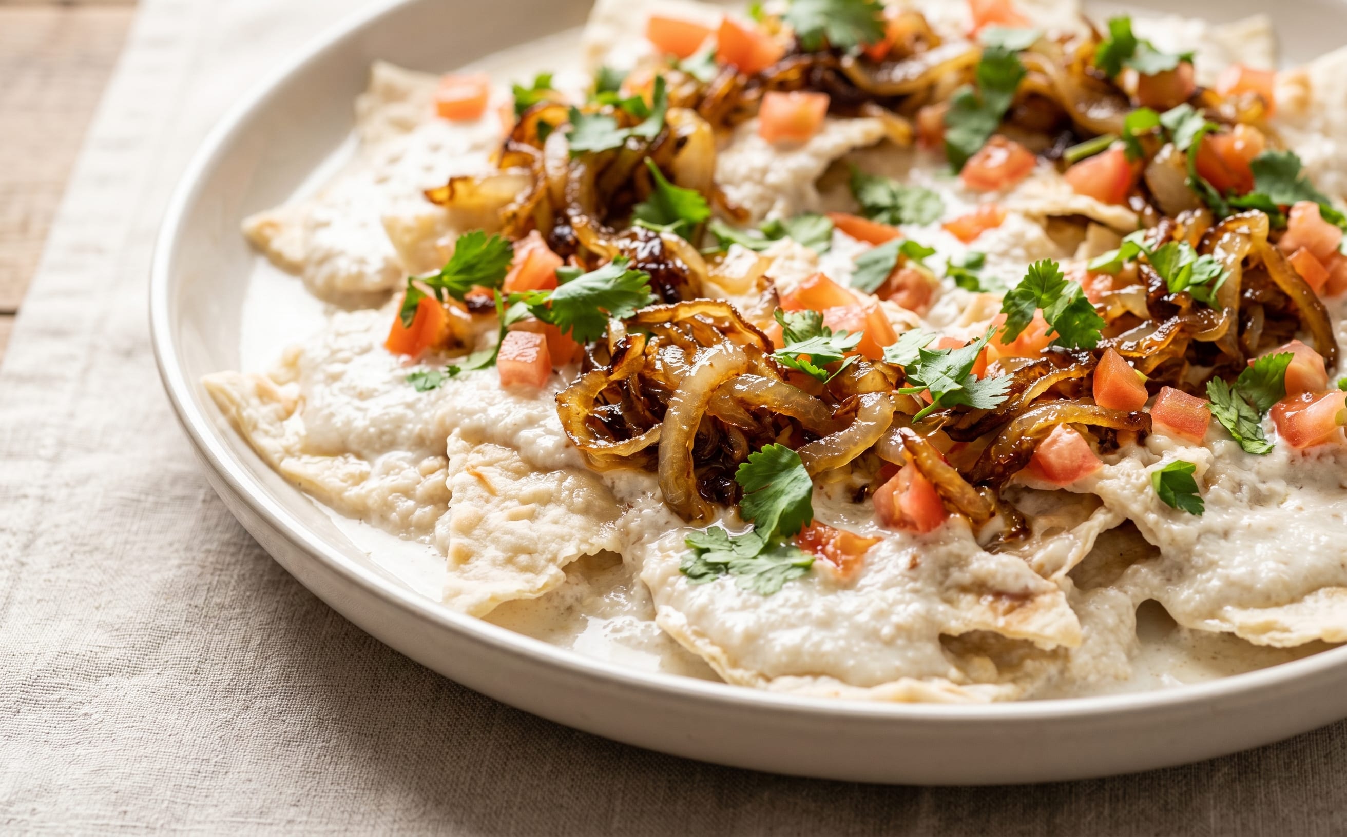 Qurutob (Flatbread with Qurut Sauce and Onions)