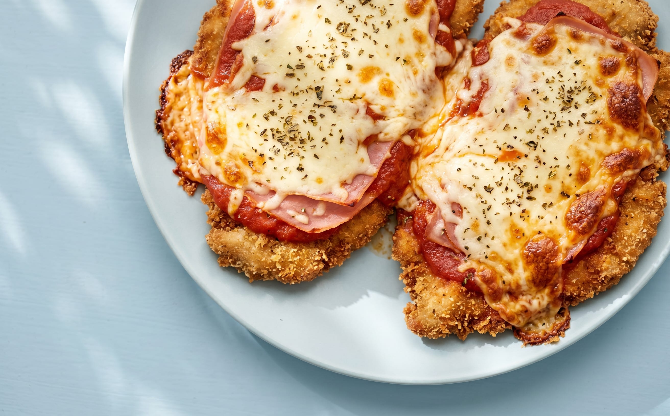 Milanesa de Pollo a la Napolitana (Chicken Cutlet with Ham and Cheese)