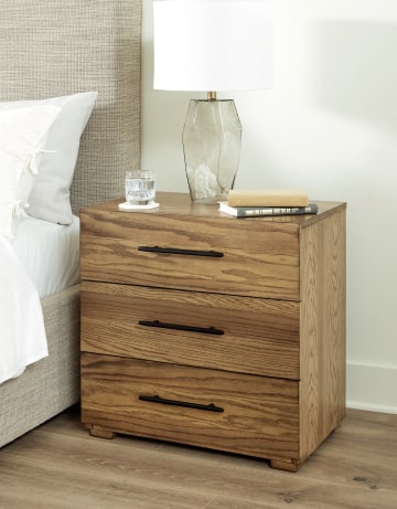 Dakmore Three Drawer Nightstand
