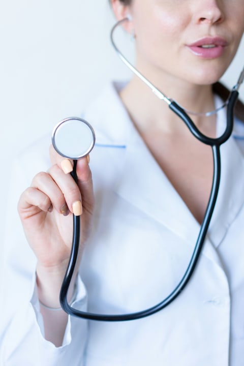 Licensed pharmacist reviewing prescription at FloraChemist online pharmacy