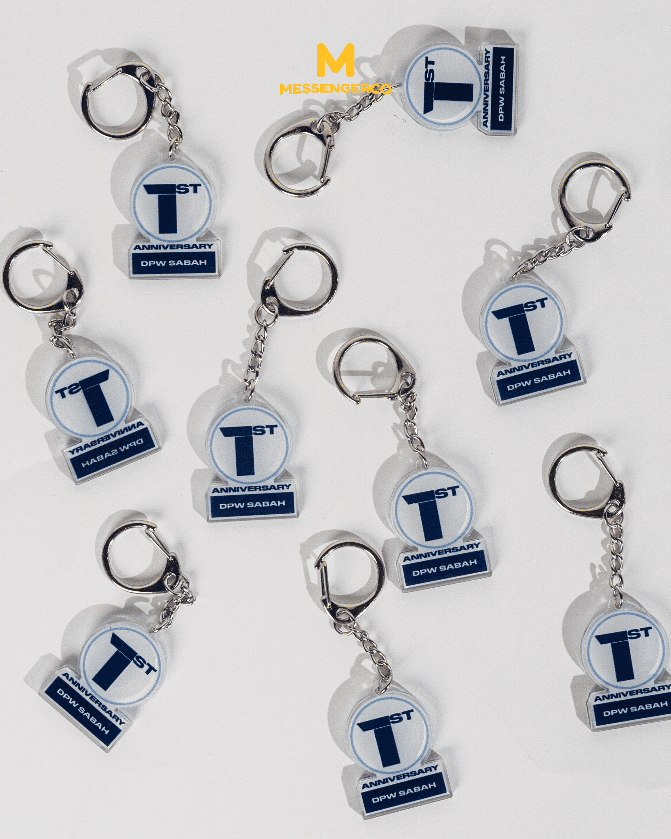 Customised acrylic keychain with space for own design, circular shape with hole at top, presented against simple background. Ideal for personalized gifting.