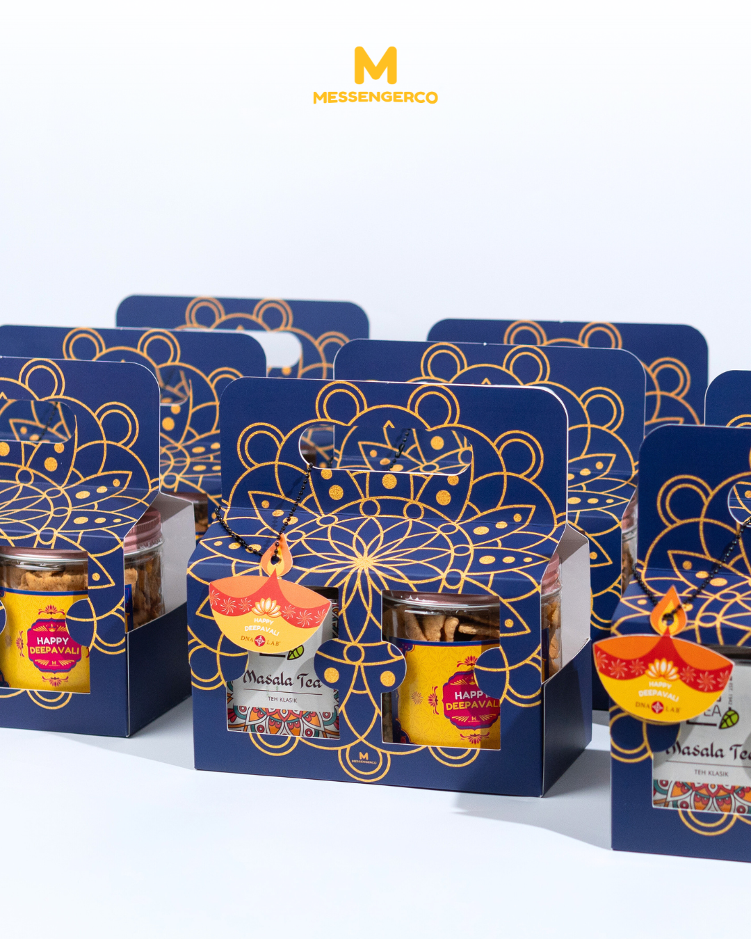 elegant navy blue deepavali cookie gift packs with gold accents arranged for dna laboratories