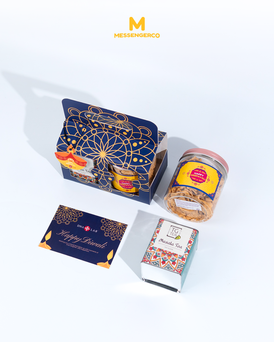 premium deepavali gift box with snacks, tea, and festive card curated for dna laboratories