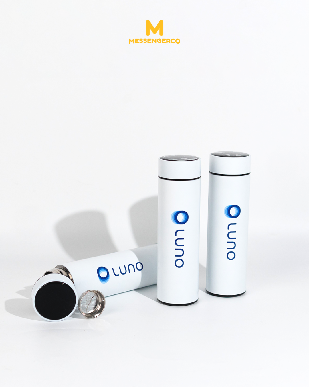 A stainless steel flask with a black handle and lid, featuring the Luno logo, on a white background, ideal for product showcase on a corporate site promoting branded thermos products.