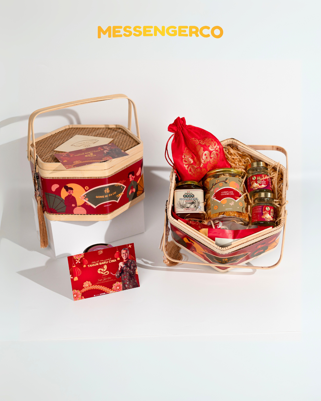 Open Chinese New Year hamper showing jars of treats, red drawstring pouch and matching greeting card on white background.