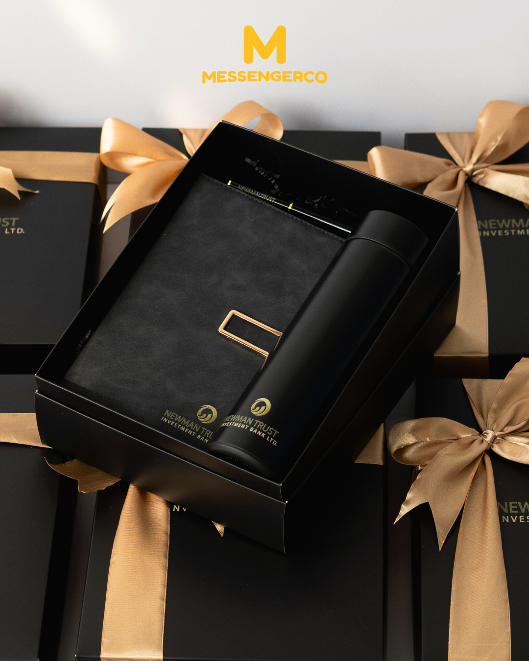 open black appreciation gift box with flask and notebook inside curated for newman trust investment bank