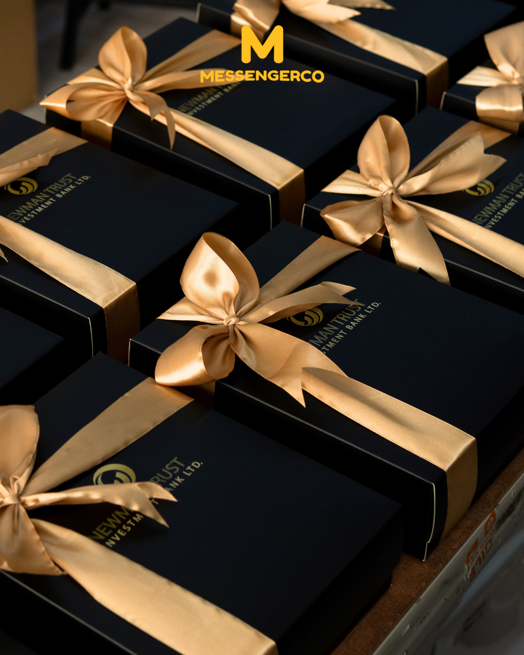 luxury black gift boxes tied with satin ribbons for newman trust investment bank appreciation gifting