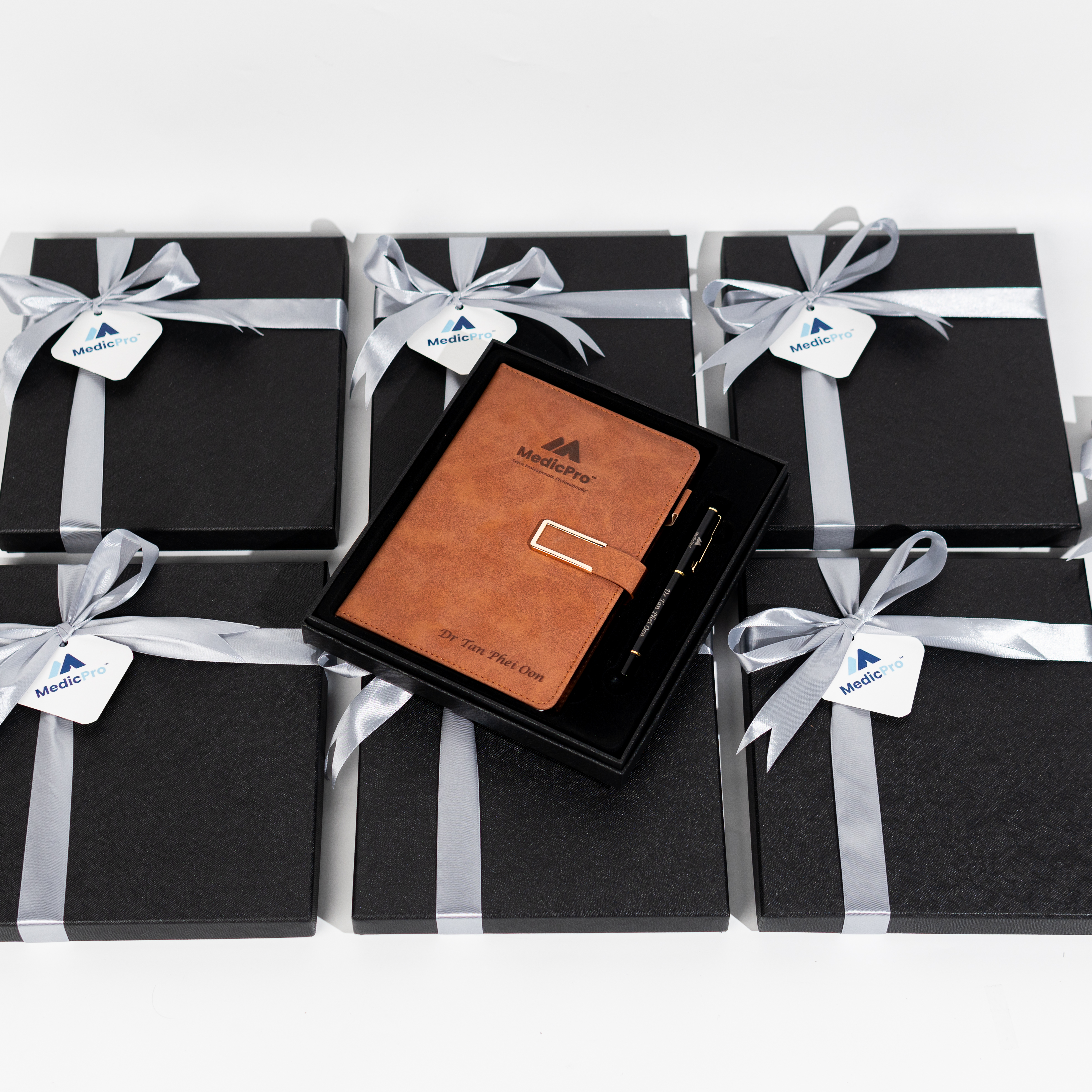 appreciation notebook set with pen presented in black matte box tied with silver ribbon for medicpro