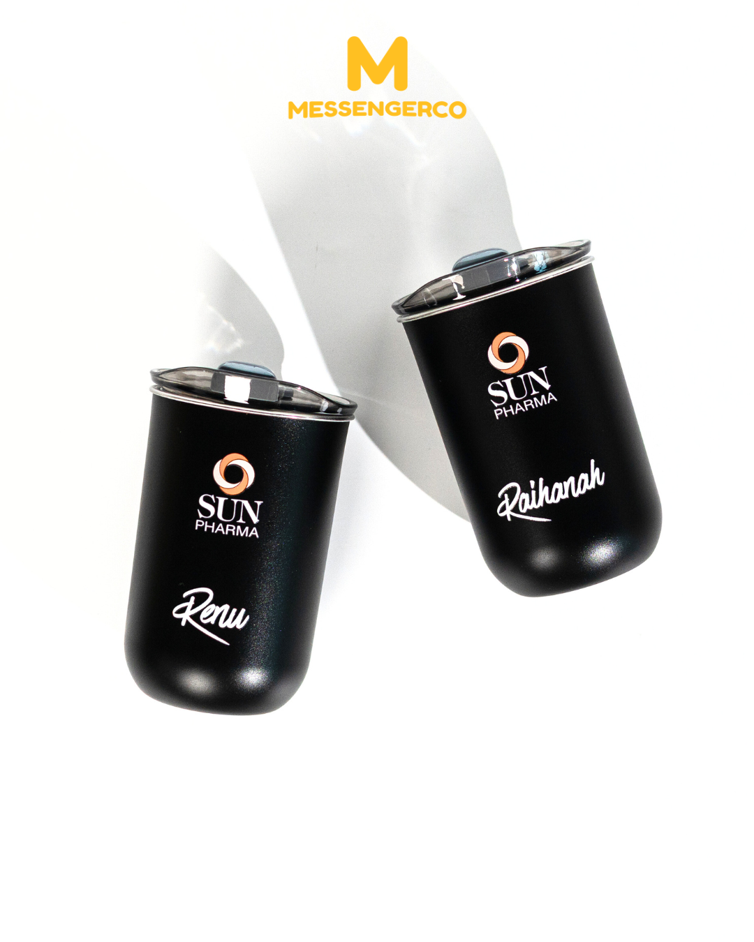 custom black tumblers featuring sun pharma branding and individual name engraving