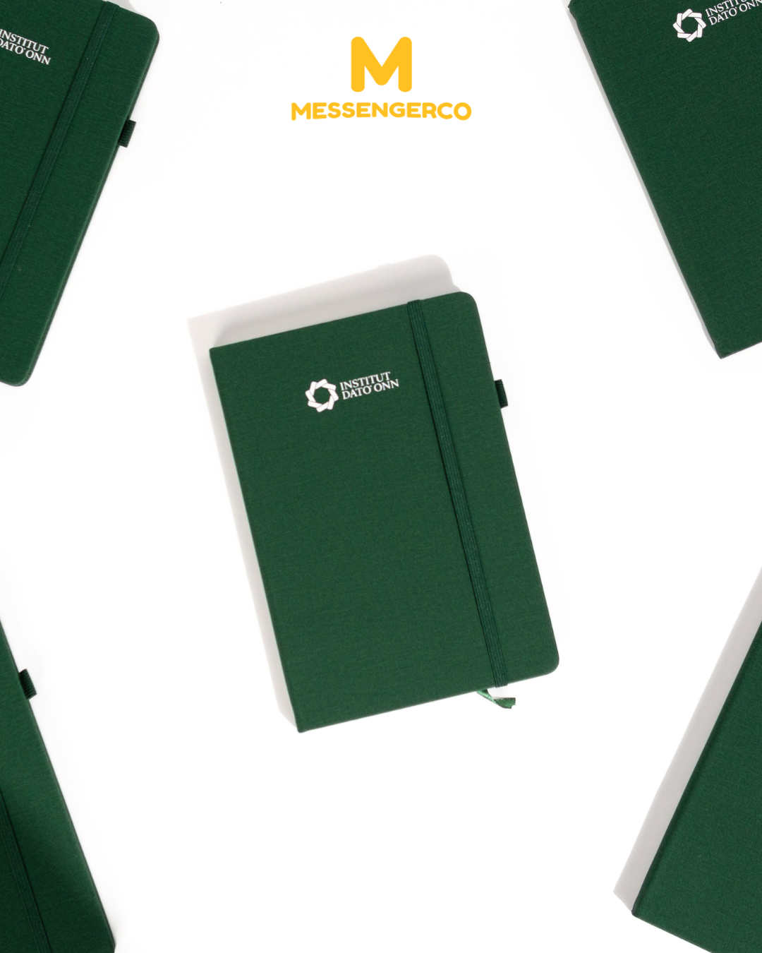 green a5 pu notebook with lakoo advertising logo as part of student seminar giveaway kit
