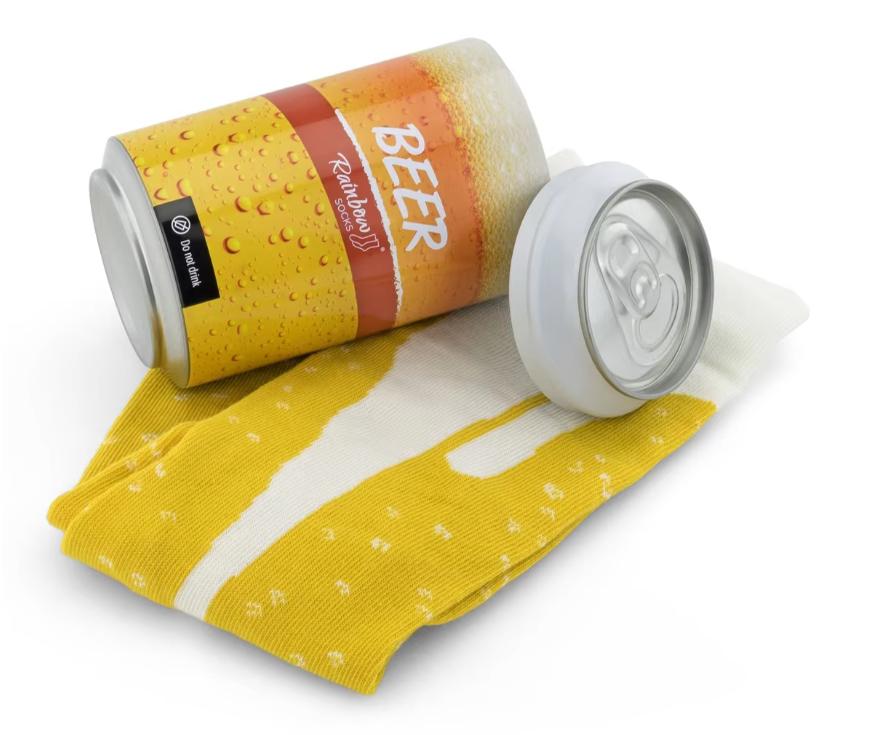 customised sock next to customised tin can orange