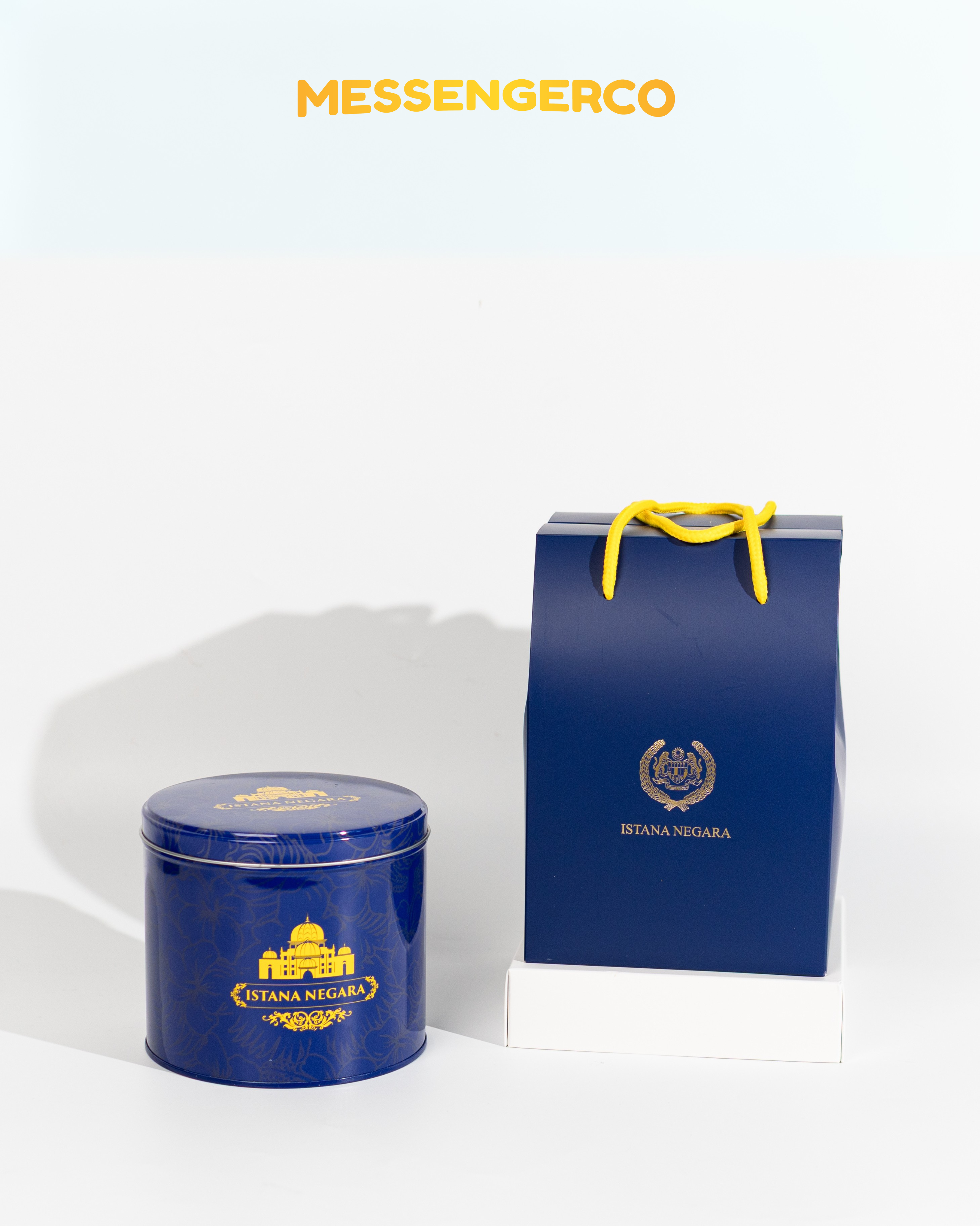 premium istana negara cookie tins and paper bags arranged for exclusive event giveaways