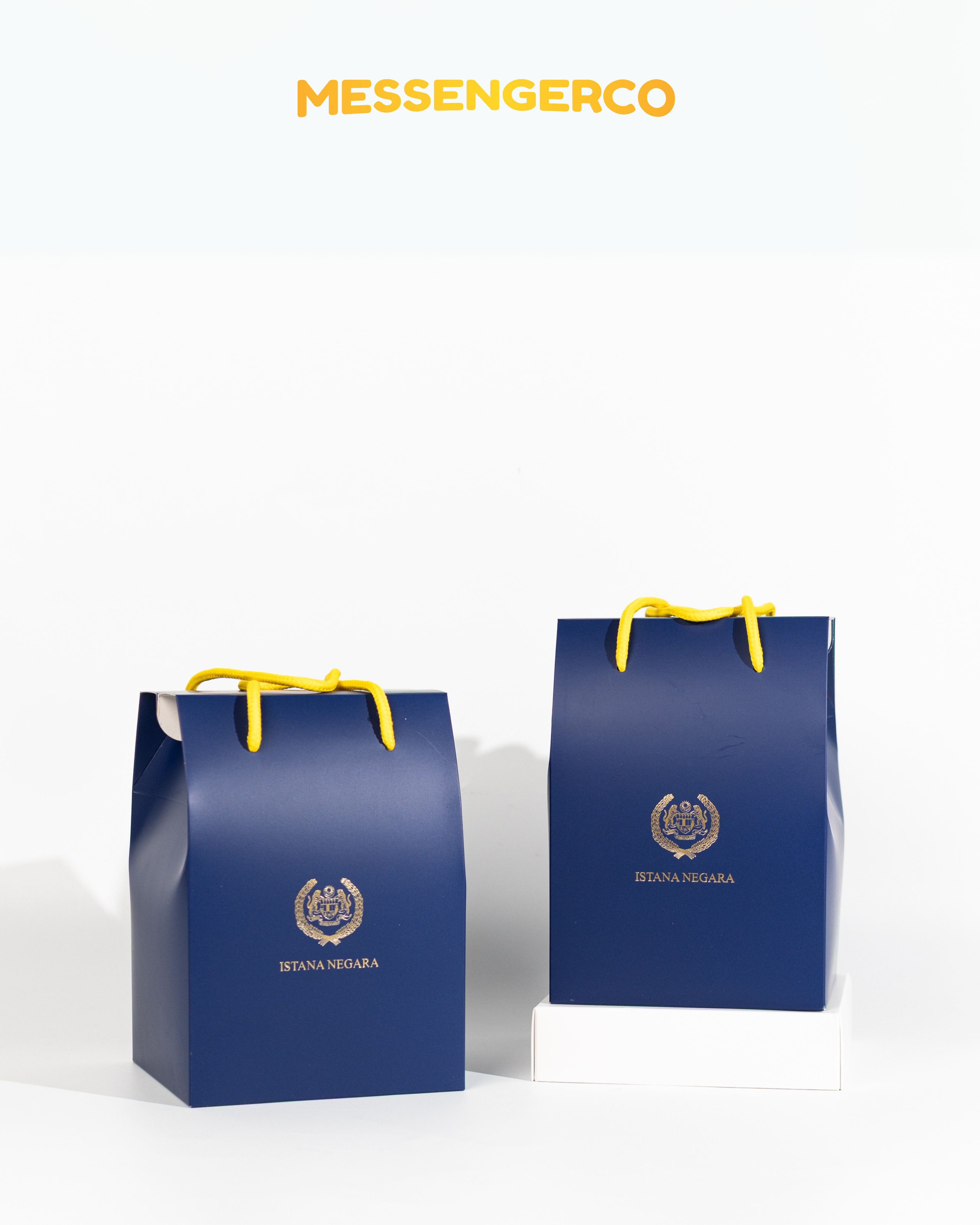 custom premium cookie tins with gold-stamped istana negara logo and matching gift bag