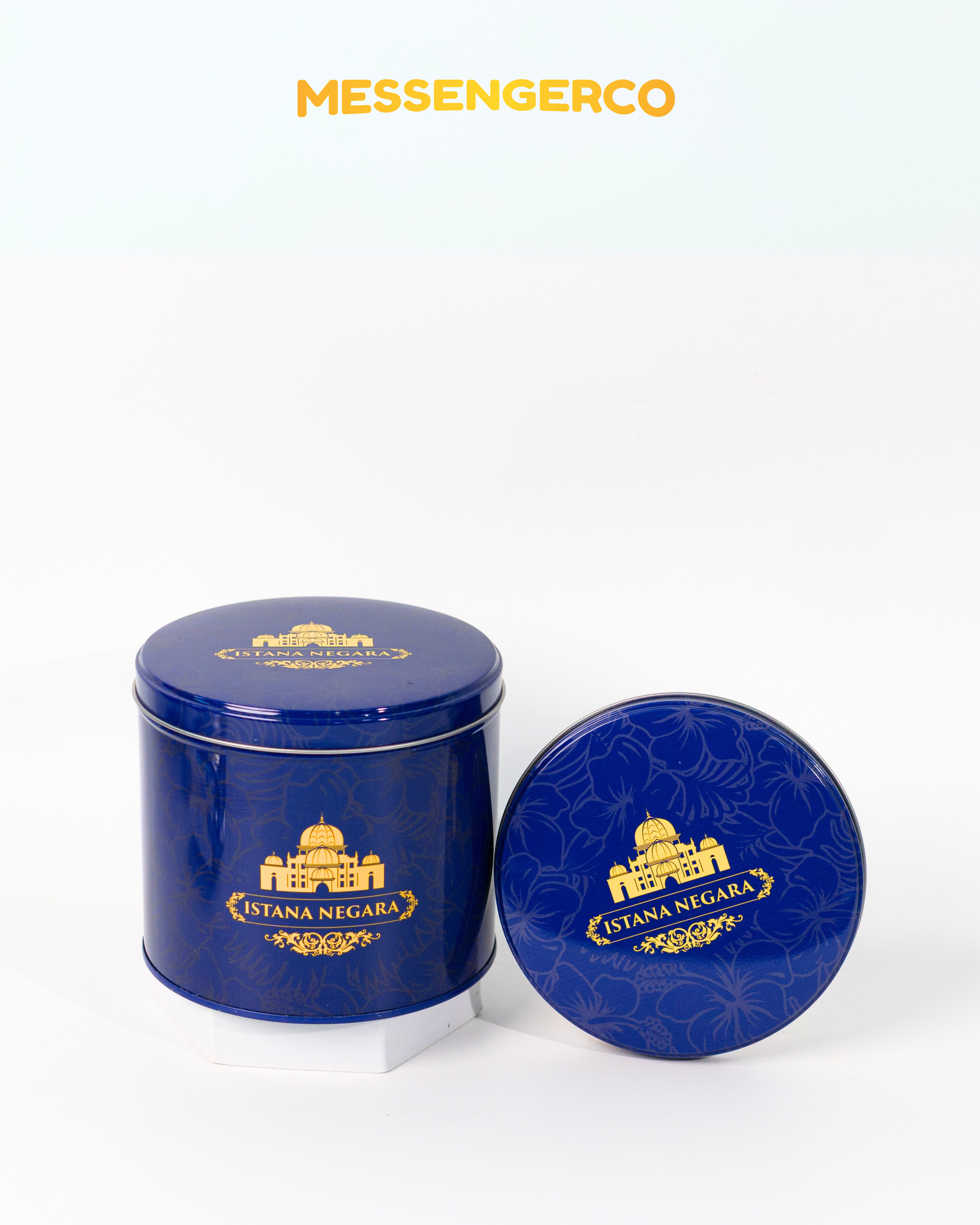 blue cookie tins and gold paper bags curated as elegant event door gifts for istana negara