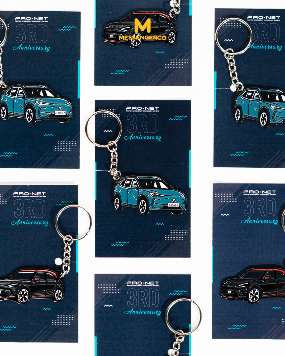 custom car-shaped keychains with proton net branding arranged on blue anniversary cards
