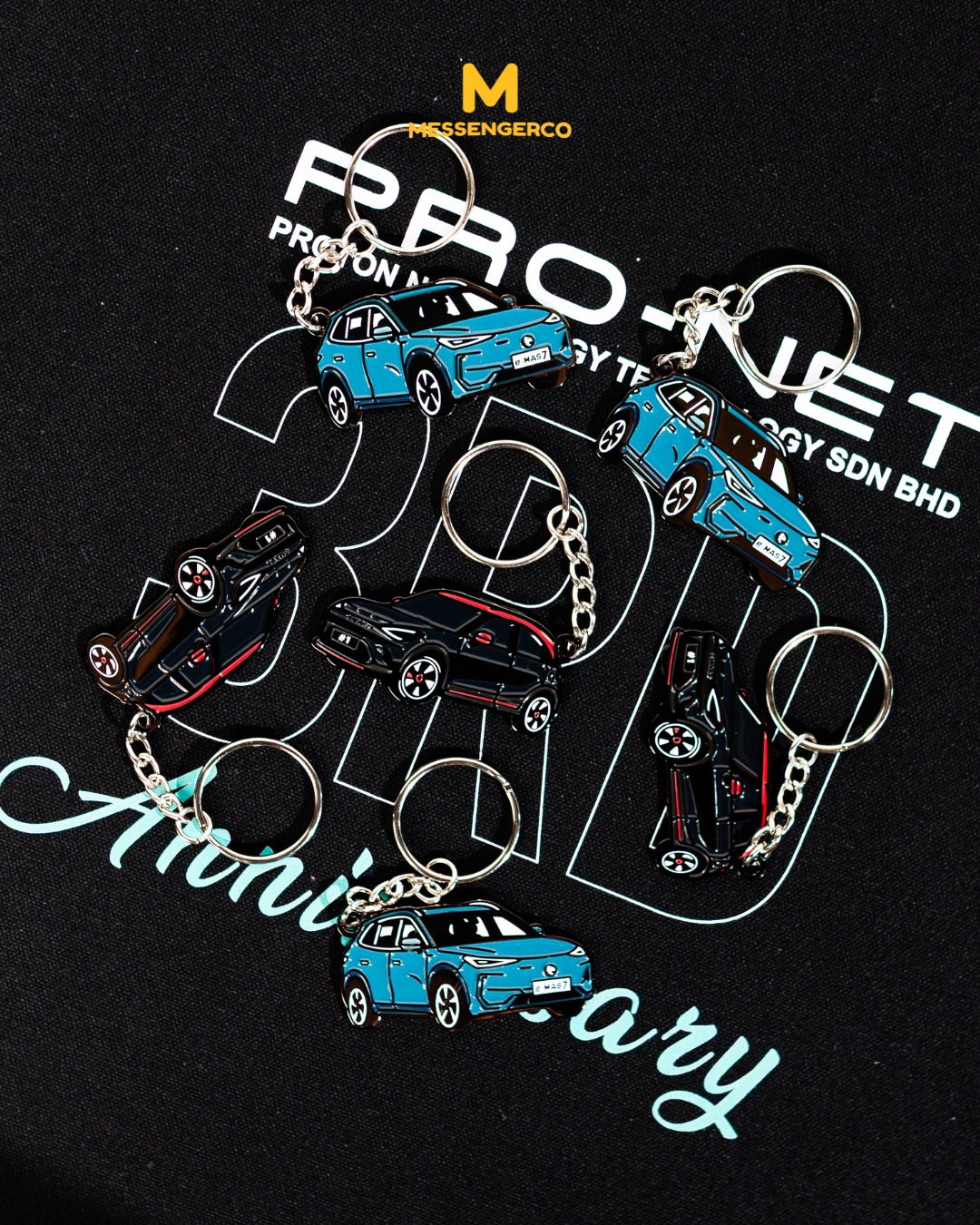 detailed close-up of enamel keychain and tote design for proton net promotional merchandise