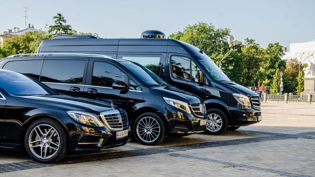Interior of a luxury vehicle for airport transfers.