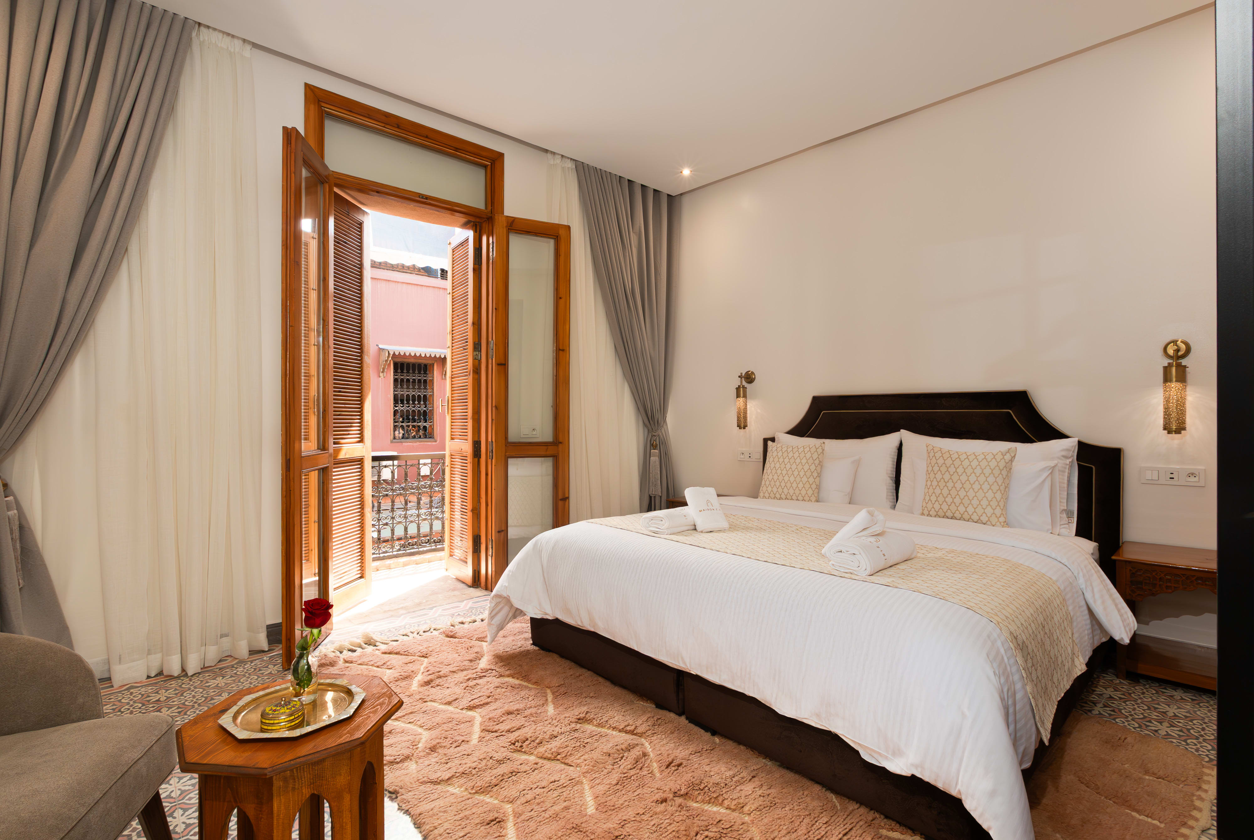 Atlas and Ambar - Prestige Room at Maison Ziri, Marrakech - king bed, carved cedar ceiling and private balcony