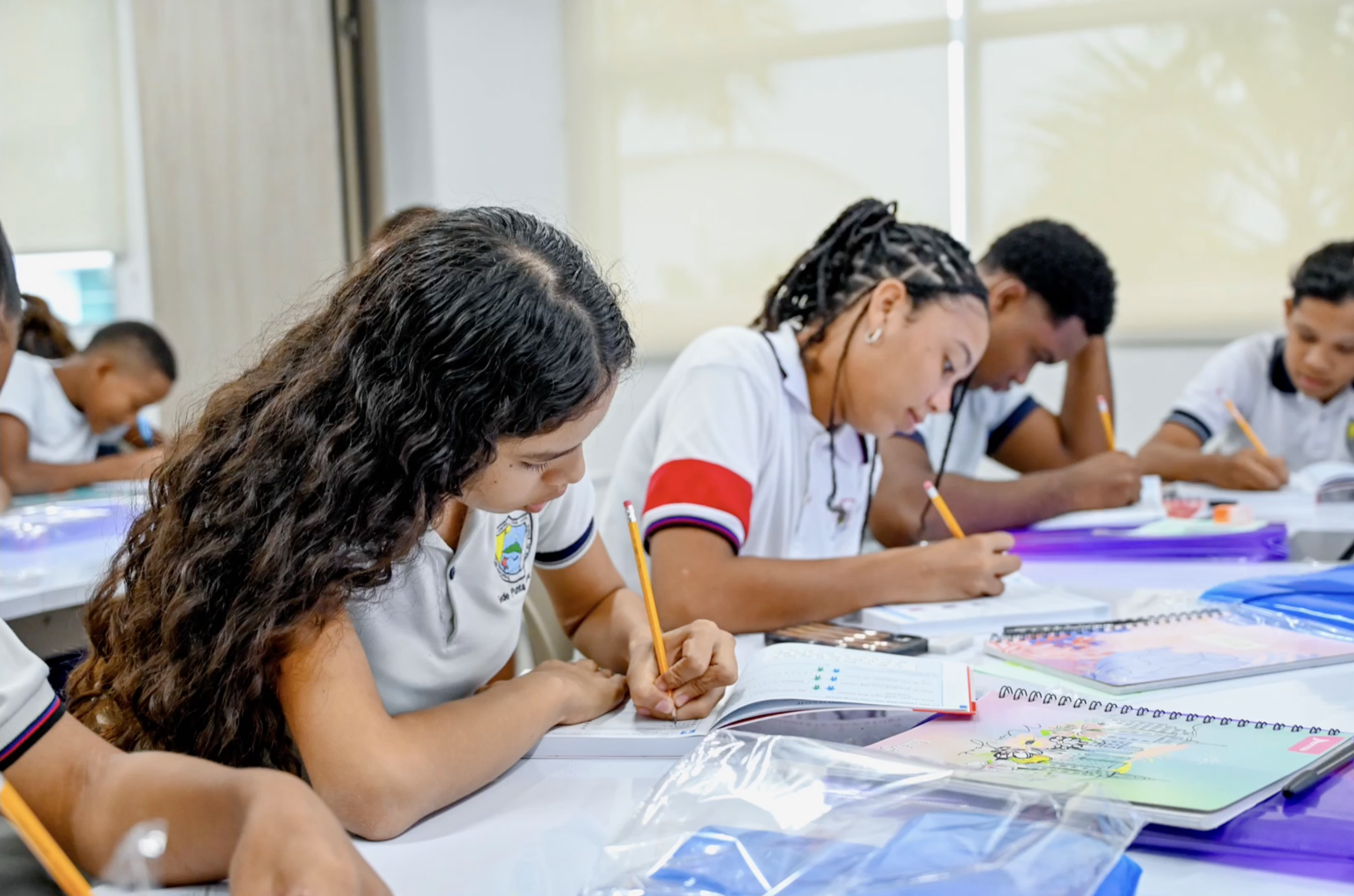 Students writing in class