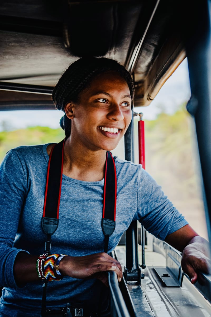 SFS student smiles from a safari vehicle in Kenya