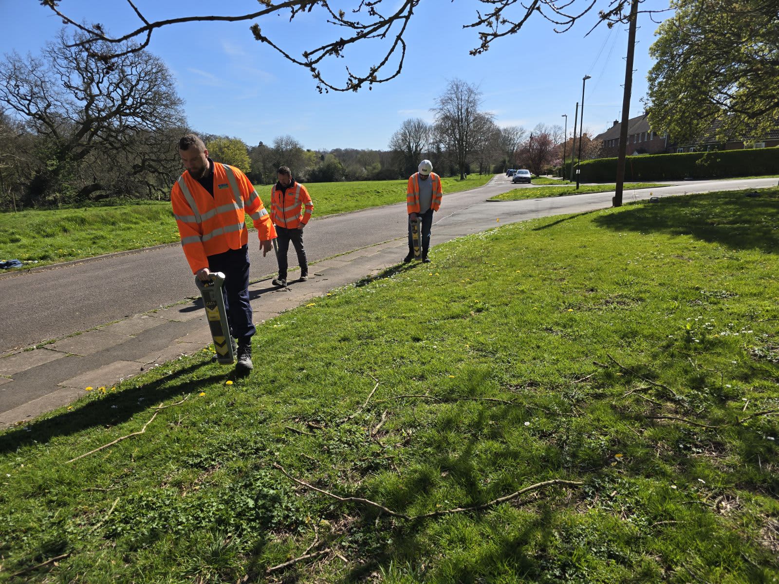 Operative using CAT locator during utility location training