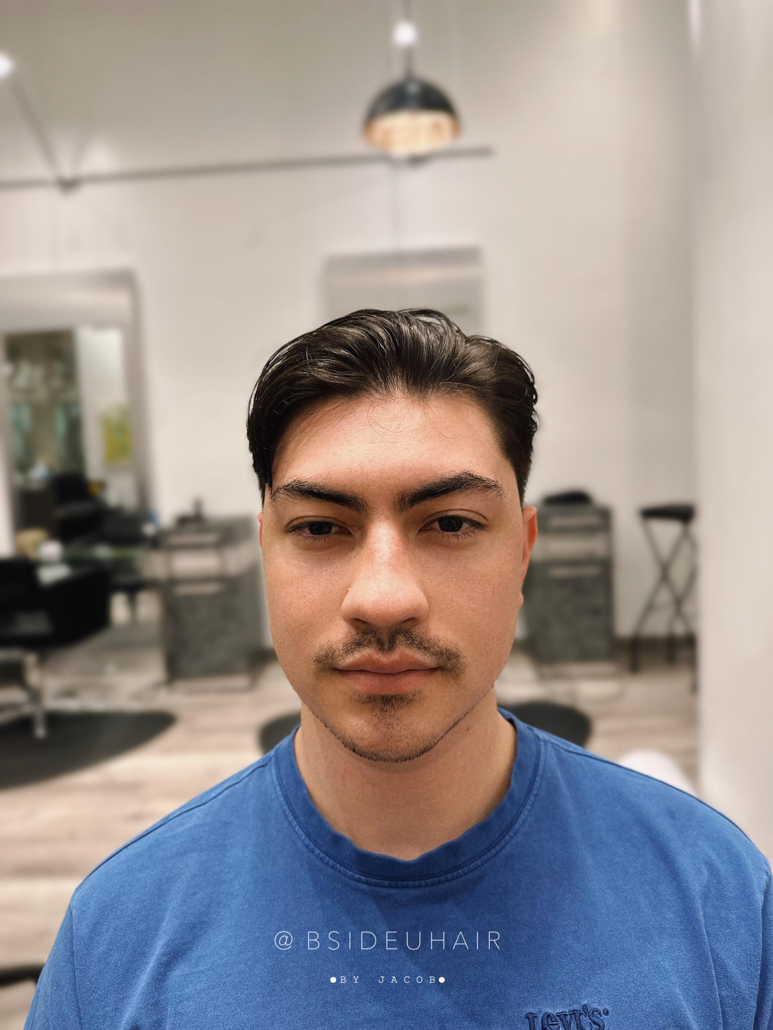 Jacob side part haircut at B SIDE U