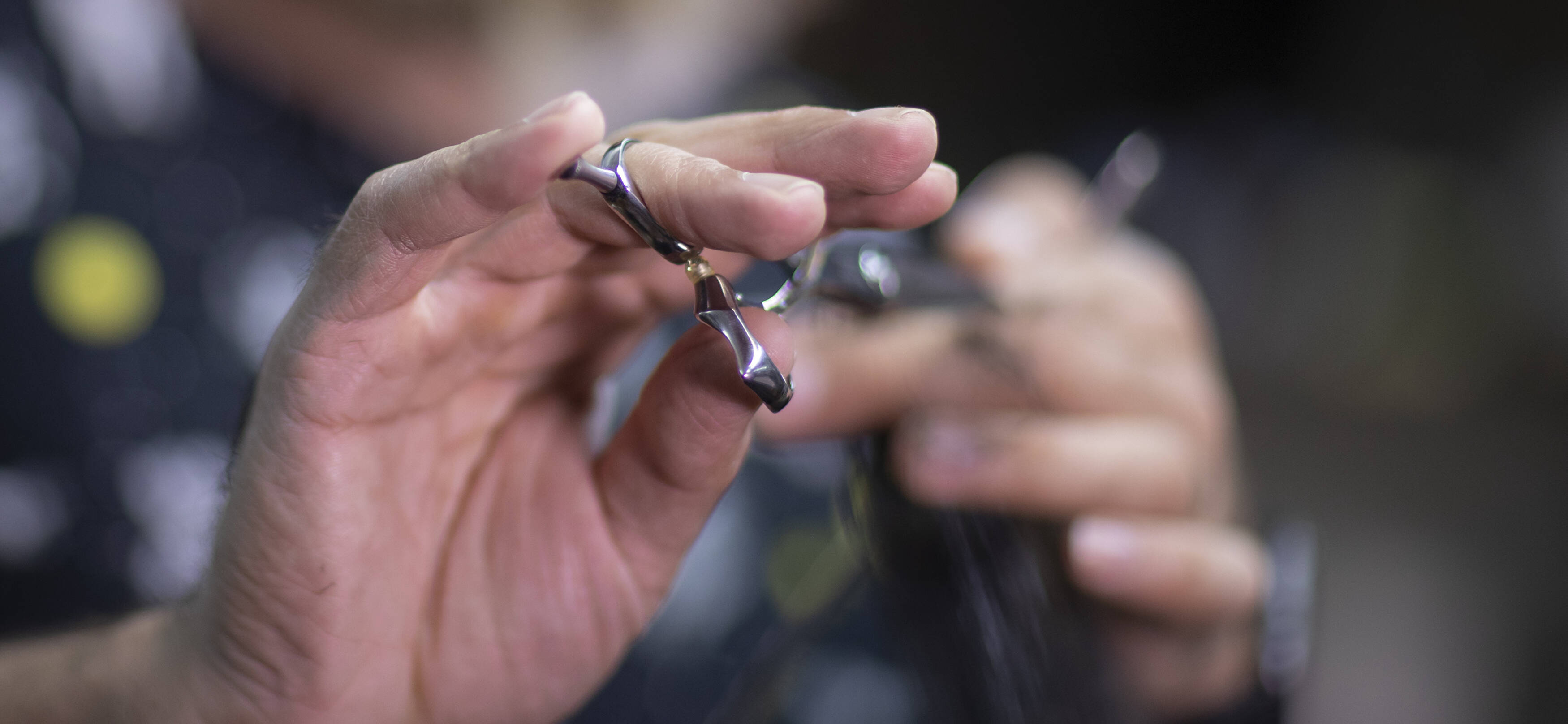 Scissors cutting hair at B SIDE U