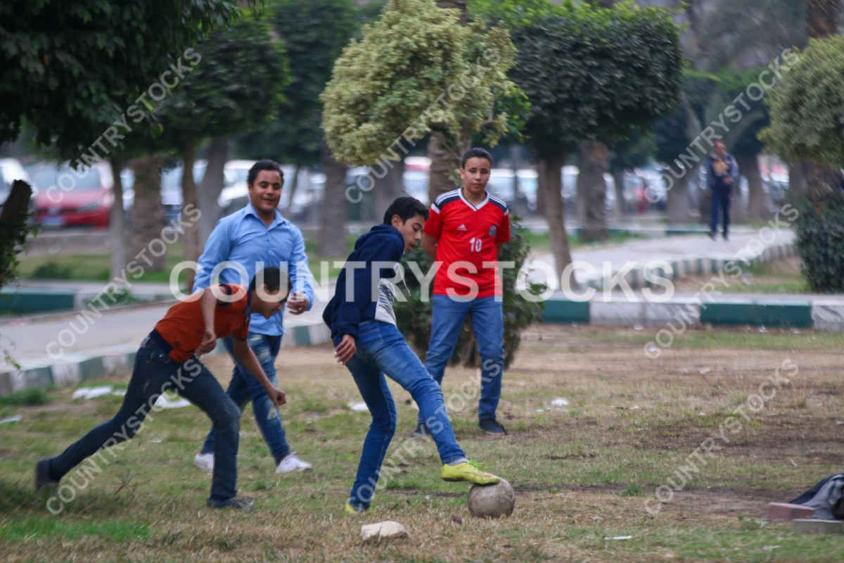 Boys playing street football in Cairo
