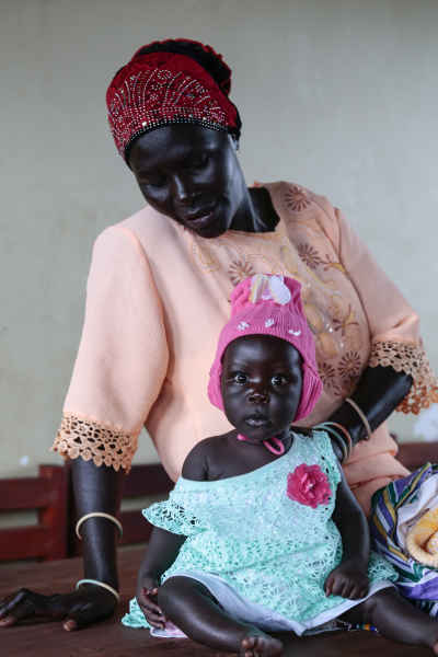 Ugandan Mother and Baby Indoors